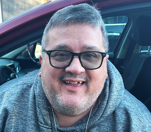 Close up of Rex smiling